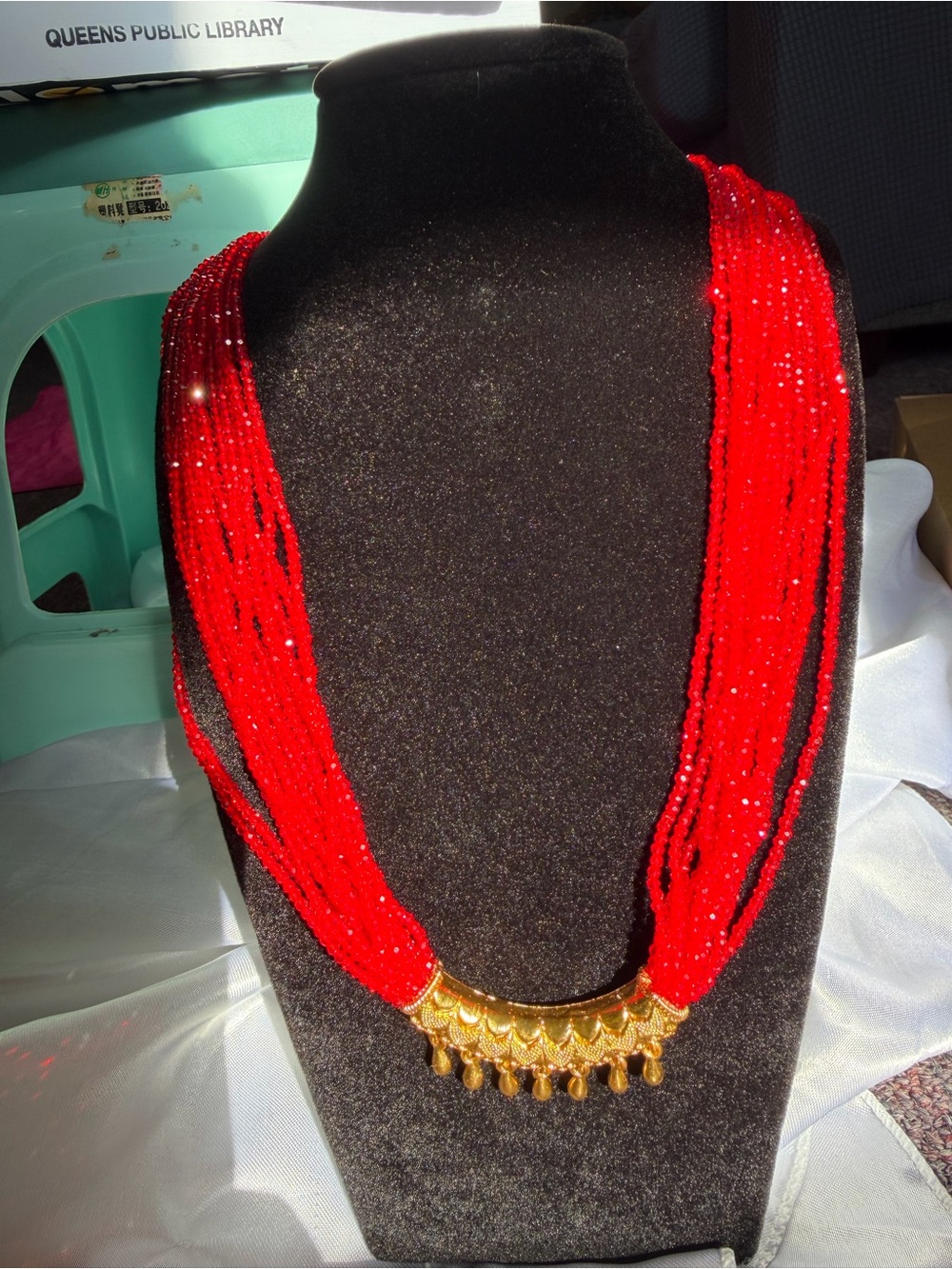 Red Multi-Strand Beaded Necklace with Gold Accent